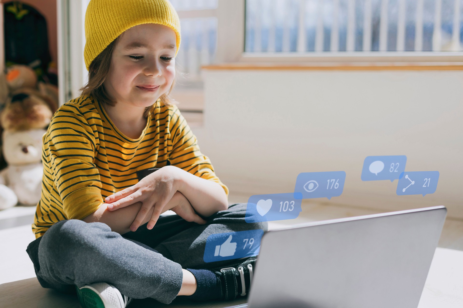 Smiling little boy making video and share on social media